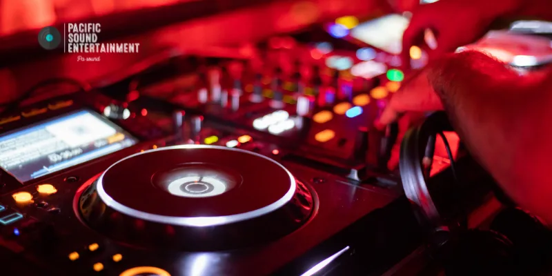 DJ performing live on Pioneer CDJs using Rekordbox software.