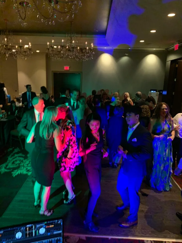 🎧 "Why Every Wedding in Vancouver Needs the Best DJ & MC Team for a Flawless Celebration" 7 people dancing on the floor in abbey