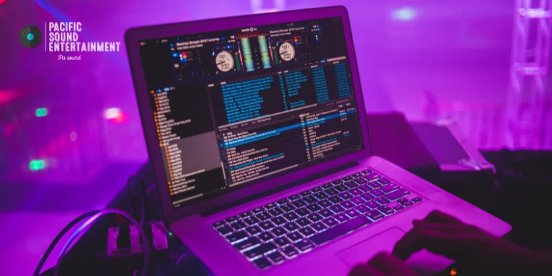 Close-up of Serato DJ Pro running on a laptop with waveform display.