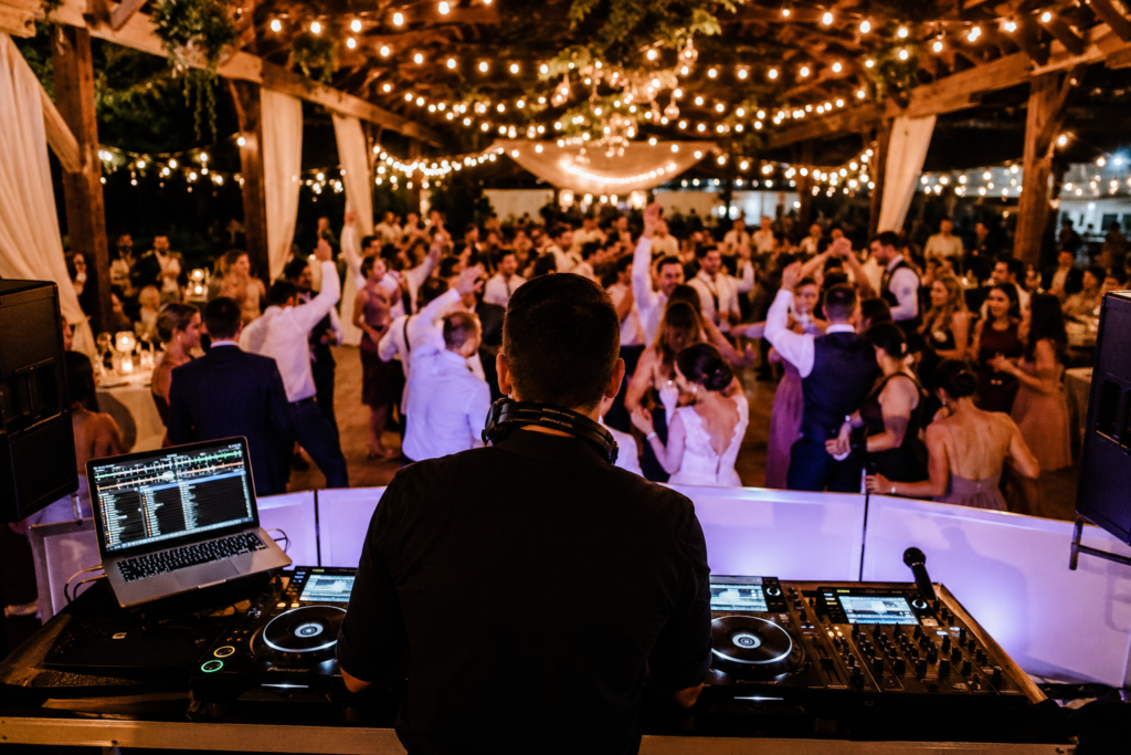 DJ vs Spotify Playlist: What Actually Changes on a Wedding Dance Floor 10 DJ vs Spotify wedding